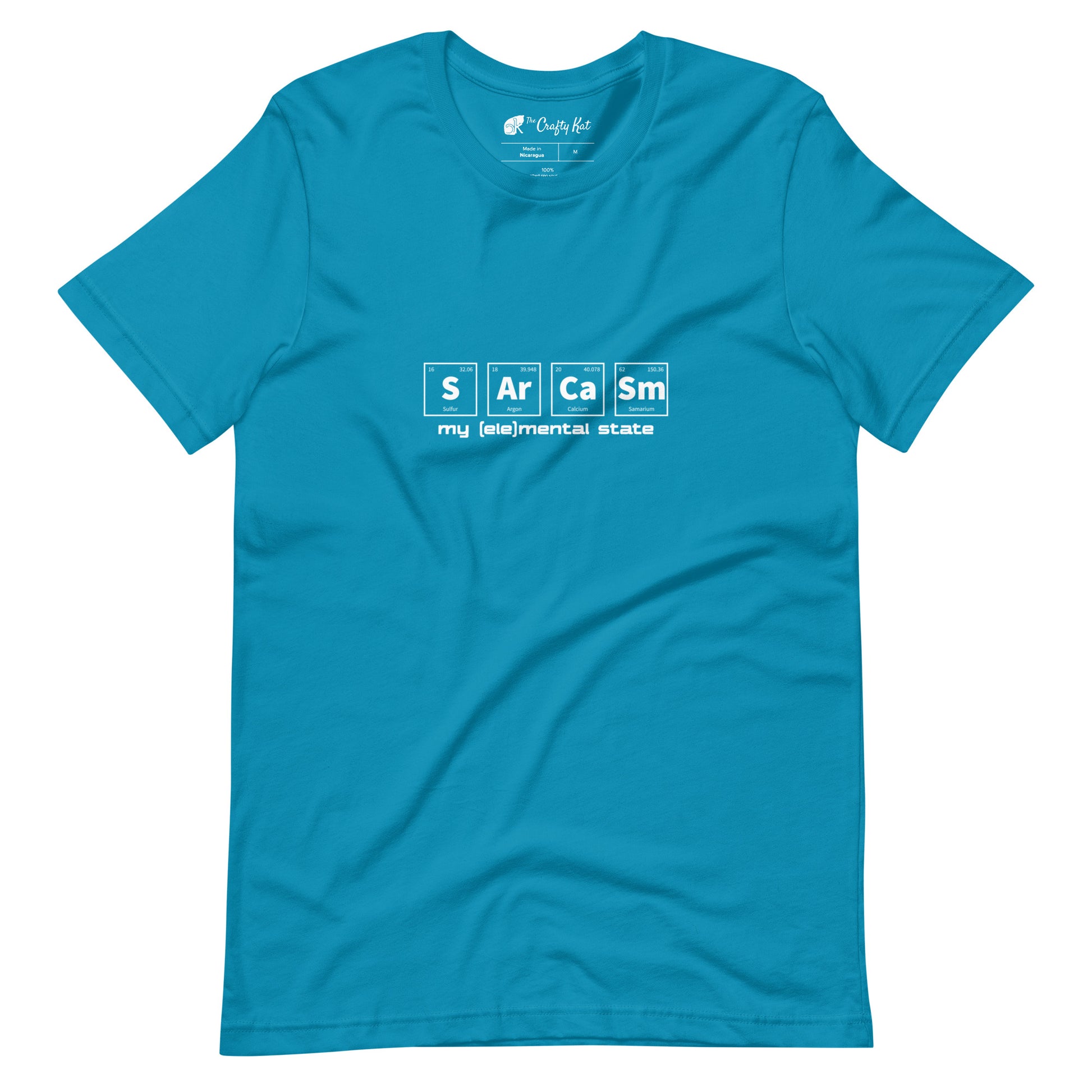 Aqua (cyan) t-shirt with graphic of periodic table of elements symbols for Sulfur (S), Argon (Ar), Calcium (Ca), and Samarium (Sm) and text "my (ele)mental state"