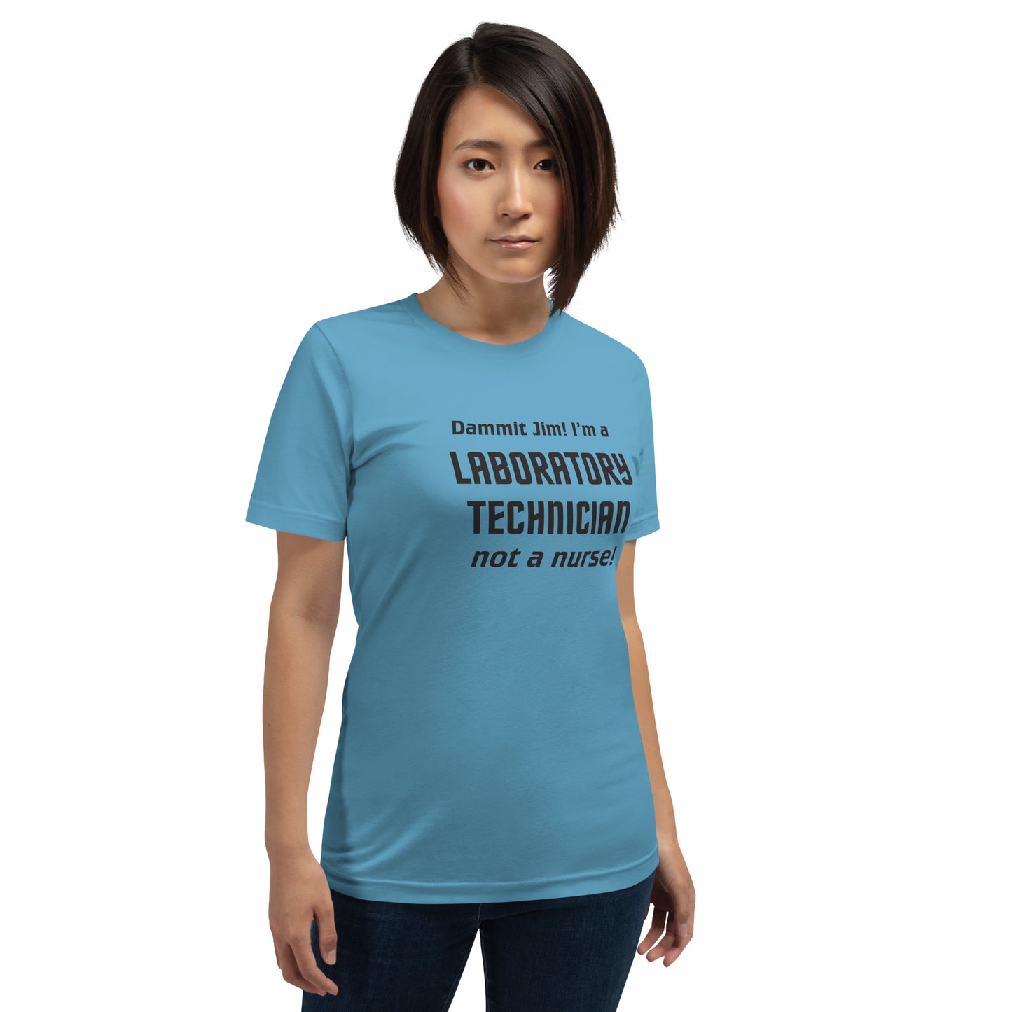 Model wearing Ocean Blue t-shirt with text graphic in Star Trek font: "Dammit Jim! I'm a LABORATORY TECHNICIAN not a nurse!"