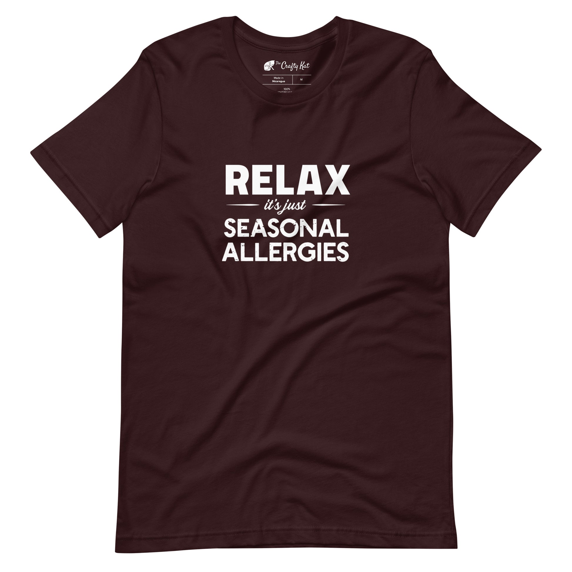 Oxblood Black t-shirt with white graphic: "RELAX it's just SEASONAL ALLERGIES"