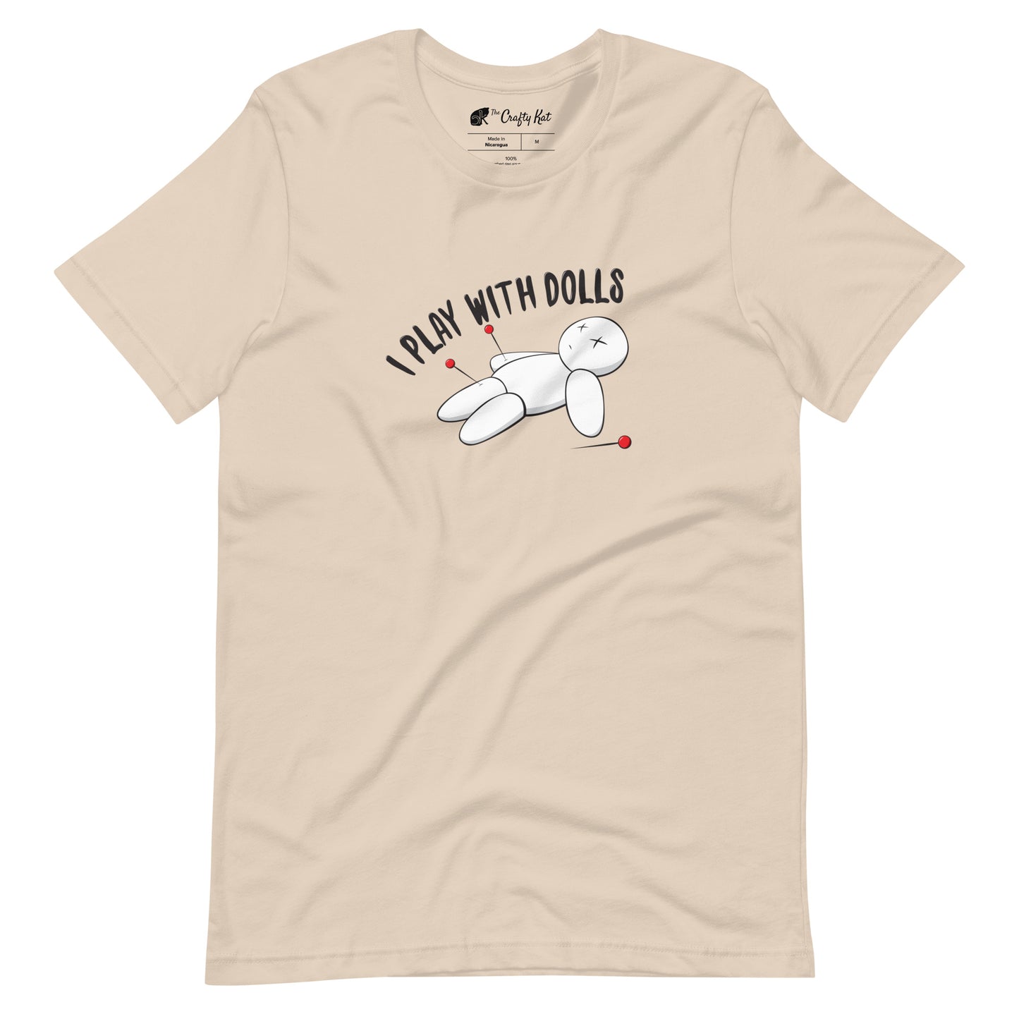 Soft Cream t-shirt with graphic of white voodoo doll with Xs for eyes stuck with several pins and text "I PLAY WITH DOLLS"