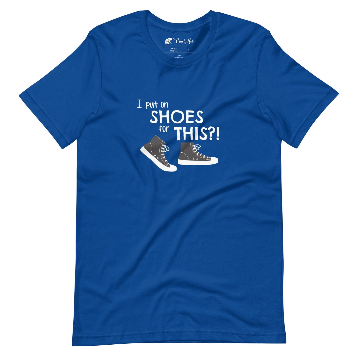 True Royal blue t-shirt with graphic of black and white canvas "chuck" sneakers and text: "I put on SHOES for THIS?!"
