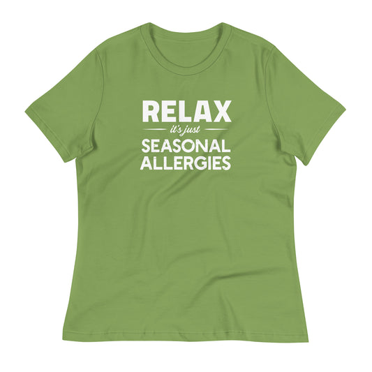 Leaf green women's relaxed fit t-shirt with white graphic: "RELAX it's just SEASONAL ALLERGIES"