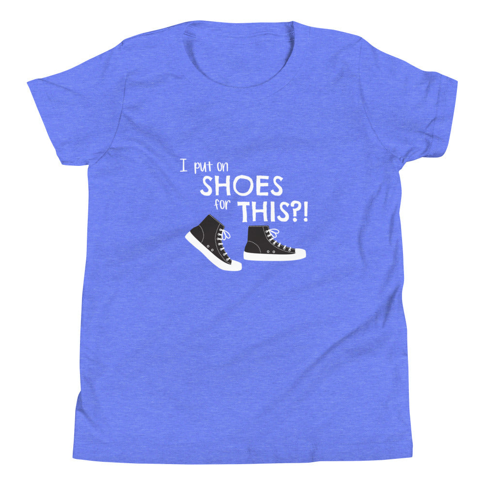 Heather Columbia Blue youth t-shirt with graphic of black and white canvas "chuck" sneakers and text: "I put on SHOES for THIS?!"