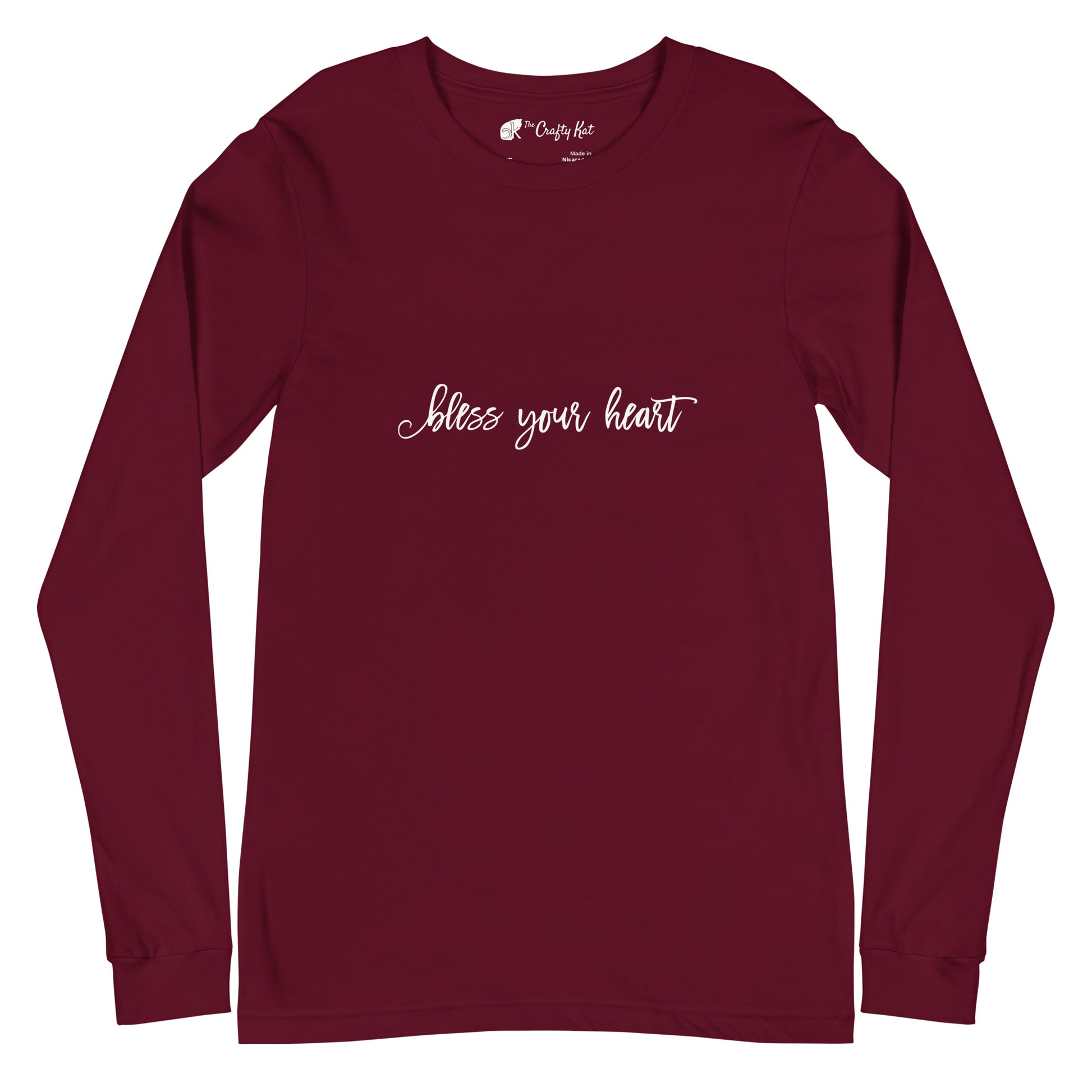 Maroon unisex long-sleeve tee with text in an excessively twee font: "bless your heart"