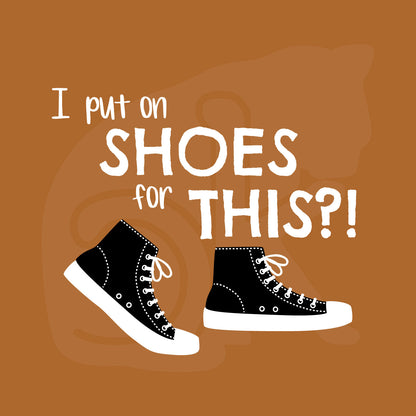 Standalone watermarked graphic of black and white canvas "chuck" sneakers and text: "I put on SHOES for THIS?!"