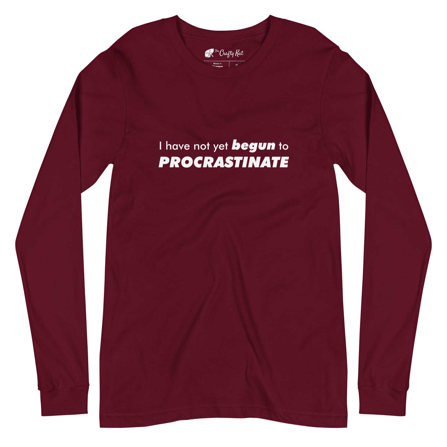 Maroon long-sleeve shirt with text graphic: "I have not yet BEGUN to PROCRASTINATE"