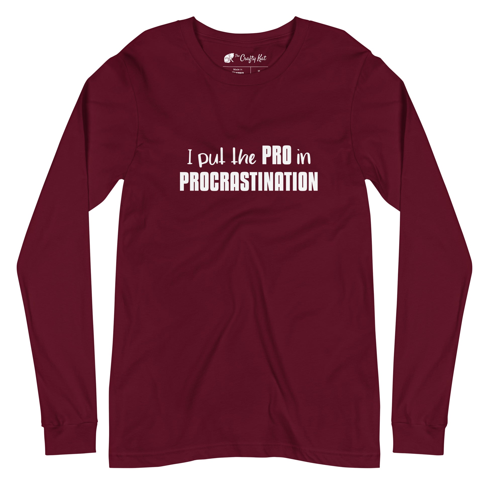 Maroon long-sleeve shirt with text graphic: "I put the PRO in PROCRASTINATION"