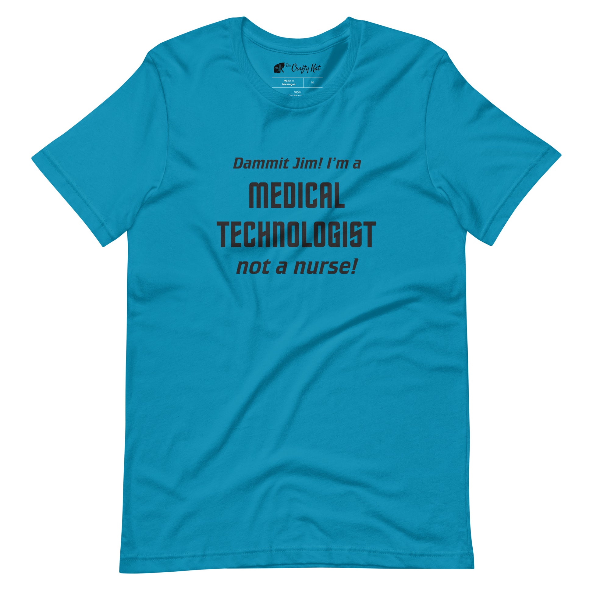 Aqua (cyan) t-shirt with text graphic in Star Trek font: "Dammit Jim! I'm a MEDICAL TECHNOLOGIST not a nurse!"