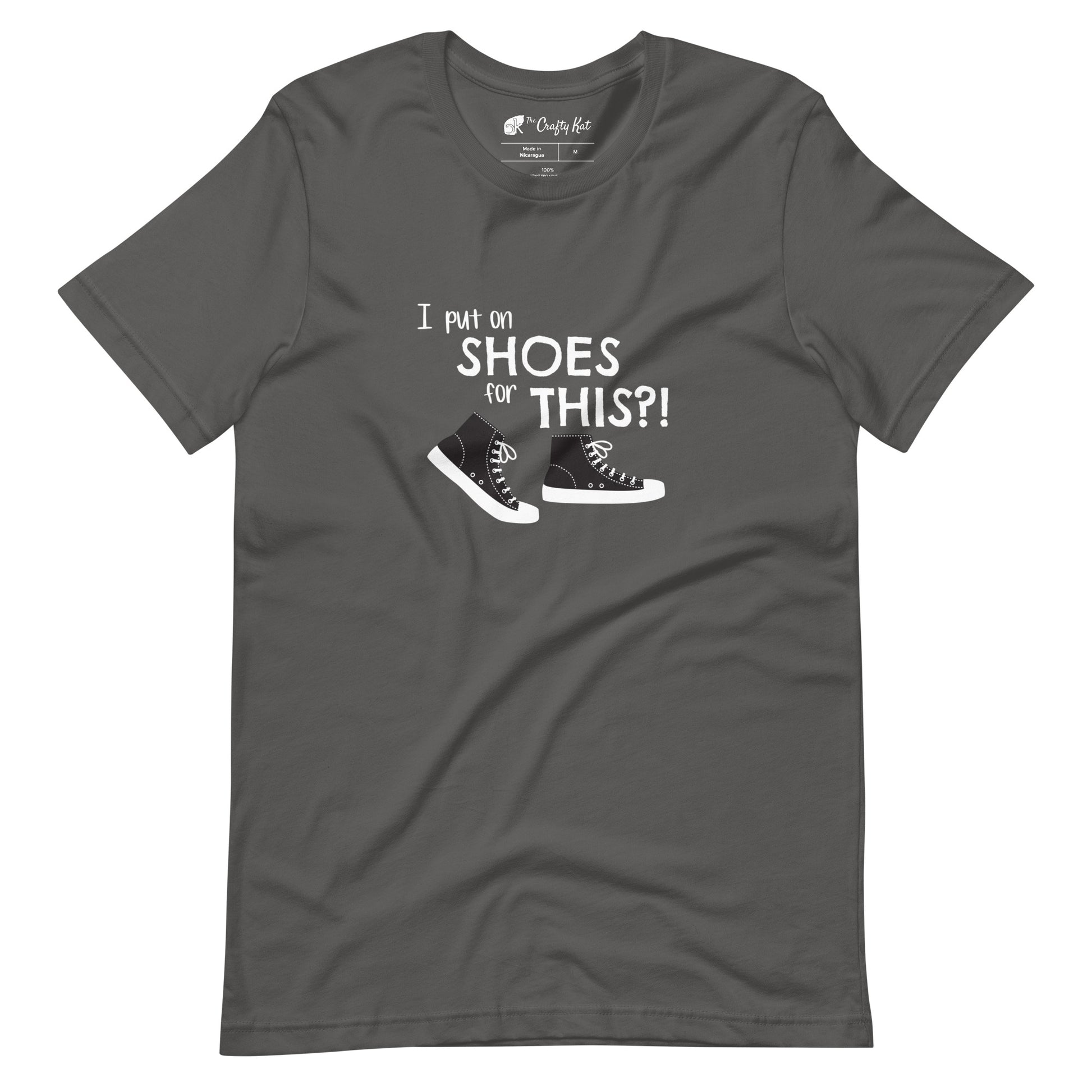 Asphalt grey t-shirt with graphic of black and white canvas "chuck" sneakers and text: "I put on SHOES for THIS?!"
