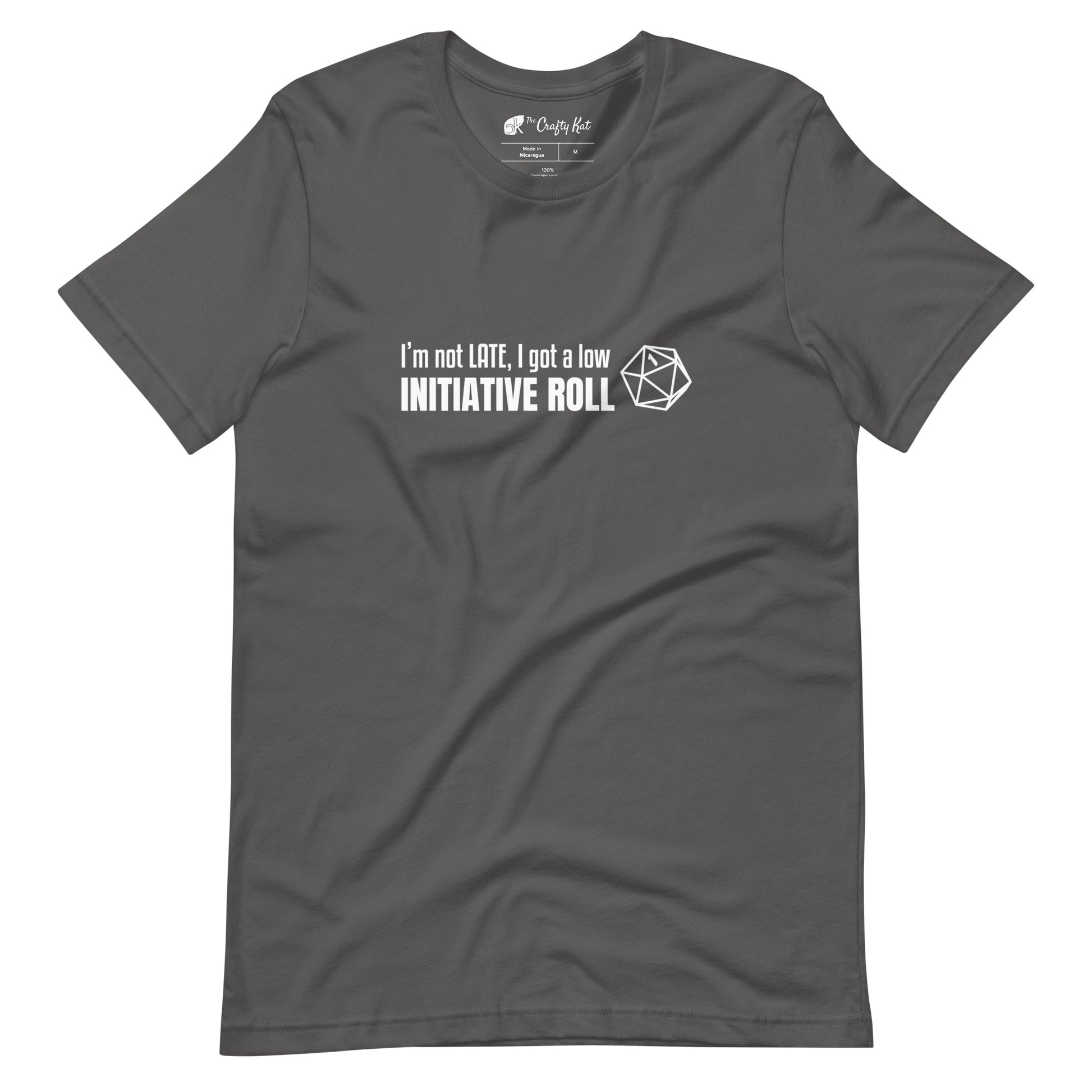 Asphalt grey unisex t-shirt with a graphic of a d20 (twenty-sided die) showing a roll of "1" and text: "I'm not LATE, I got a low INITIATIVE ROLL"