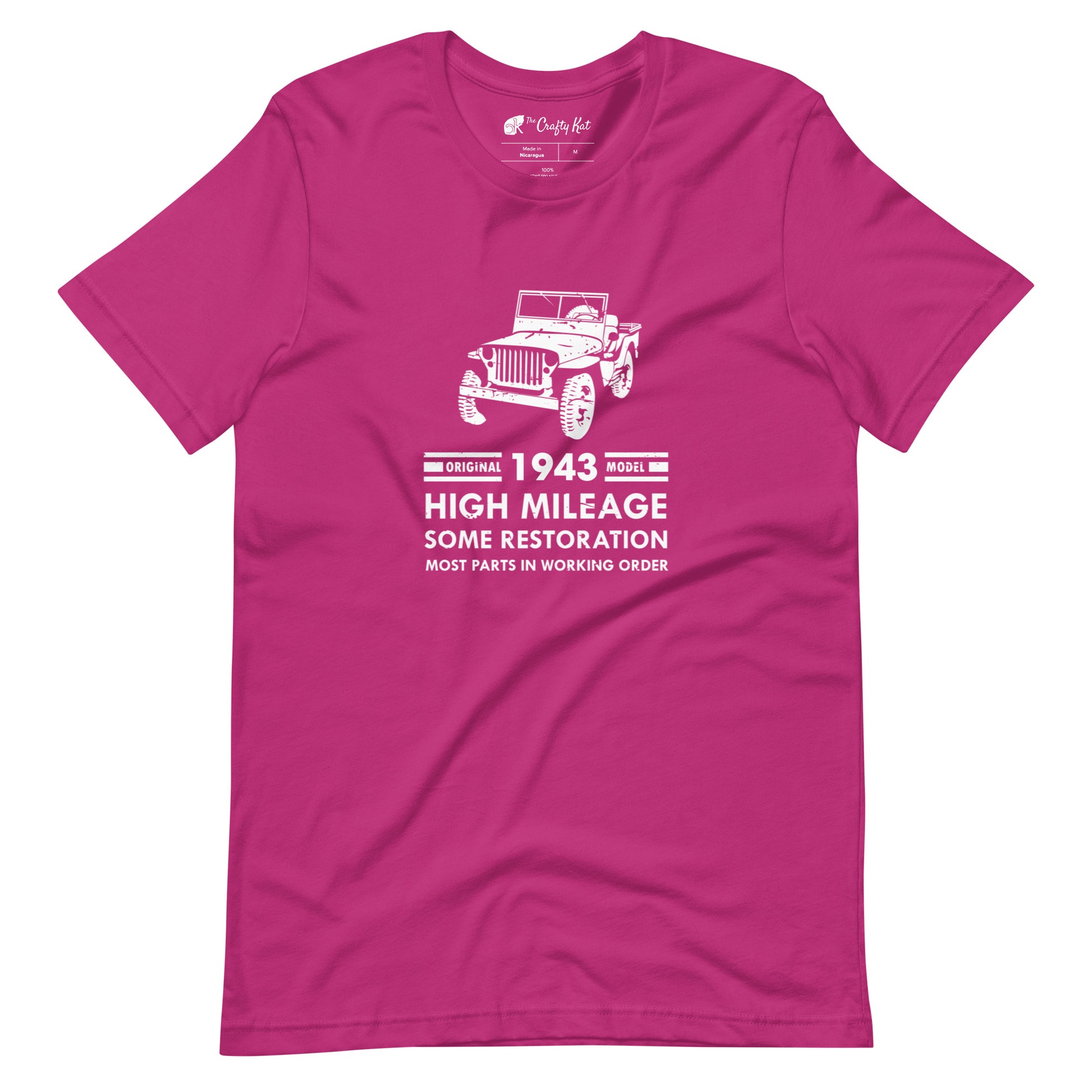 Berry (hot pink) t-shirt with distressed graphic of old military jeep and text "Original YEAR model HIGH MILEAGE some restoration MOST PARTS IN WORKING ORDER"