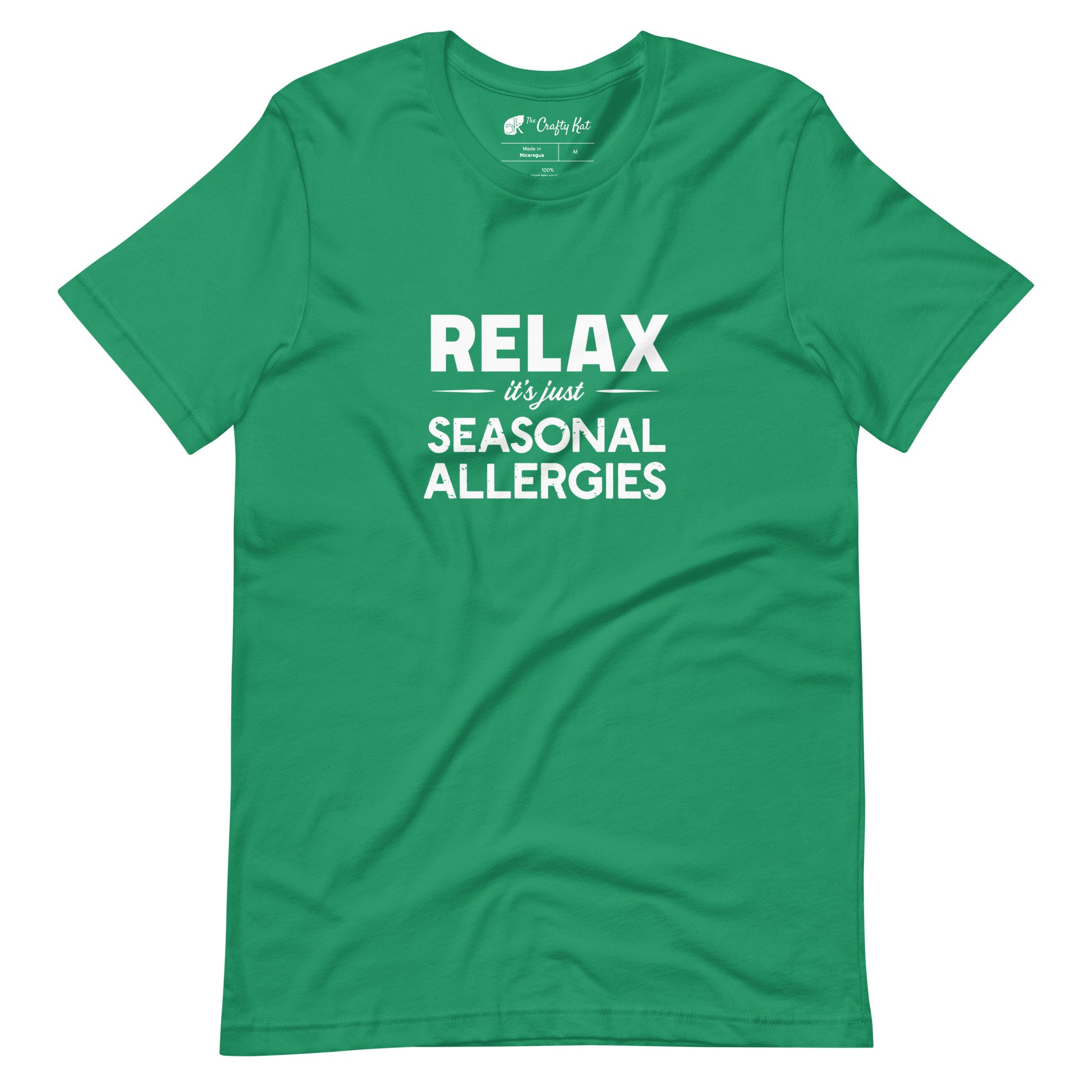 Kelly green t-shirt with white graphic: "RELAX it's just SEASONAL ALLERGIES"