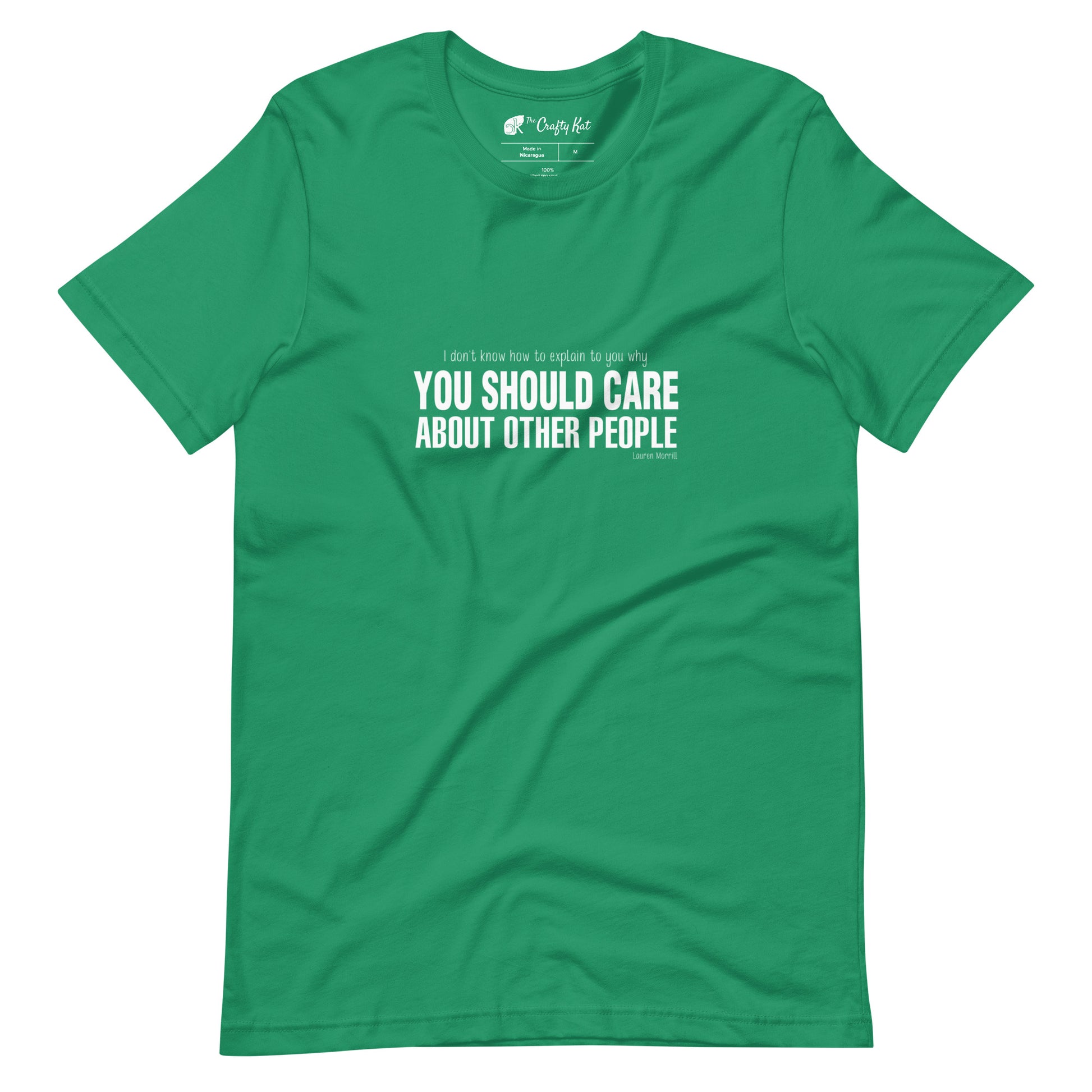 Kelly green t-shirt with quote by Lauren Morrill: "I don't know how to explain to you why YOU SHOULD CARE ABOUT OTHER PEOPLE"