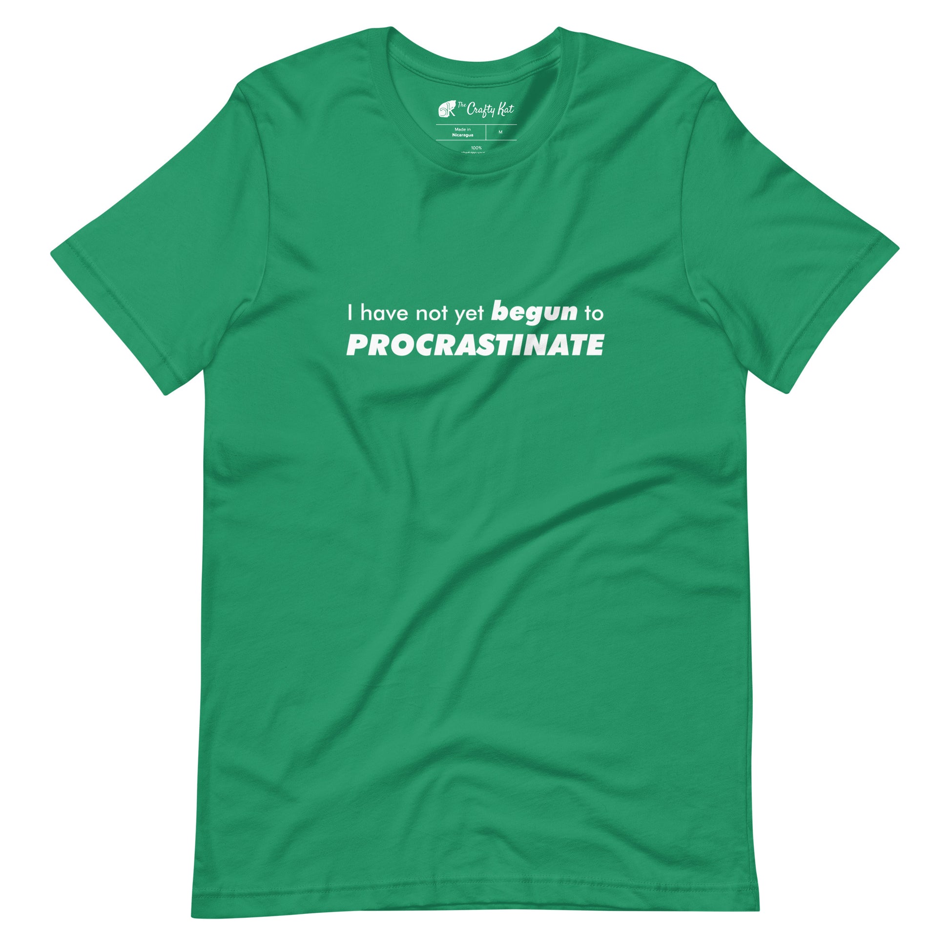 Kelly green t-shirt with text graphic: "I have not yet BEGUN to PROCRASTINATE"