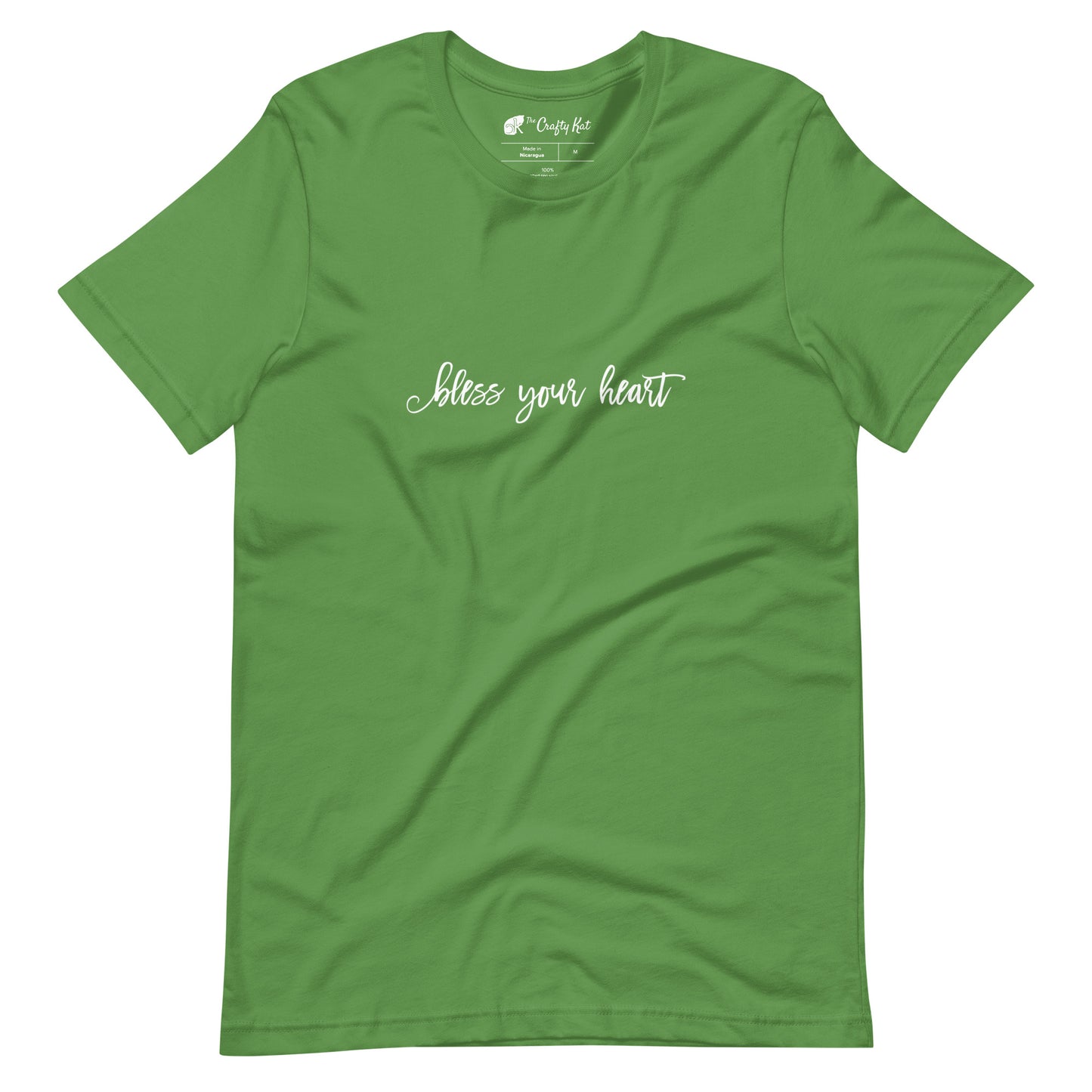 Leaf green t-shirt with white graphic in an excessively twee font: "bless your heart"