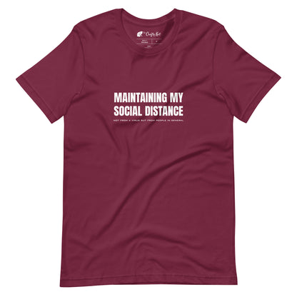 Maroon t-shirt with white graphic: "MAINTAINING MY SOCIAL DISTANCE not from a virus but from people in general"
