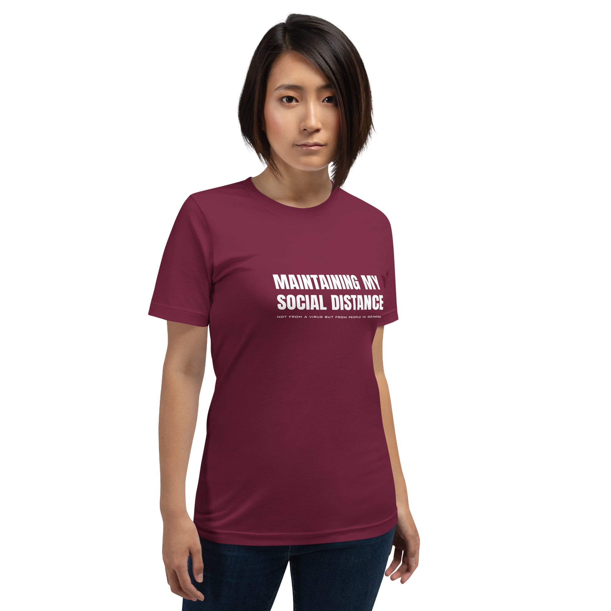 A model wearing a maroon t-shirt with white graphic: "MAINTAINING MY SOCIAL DISTANCE not from a virus but from people in general"