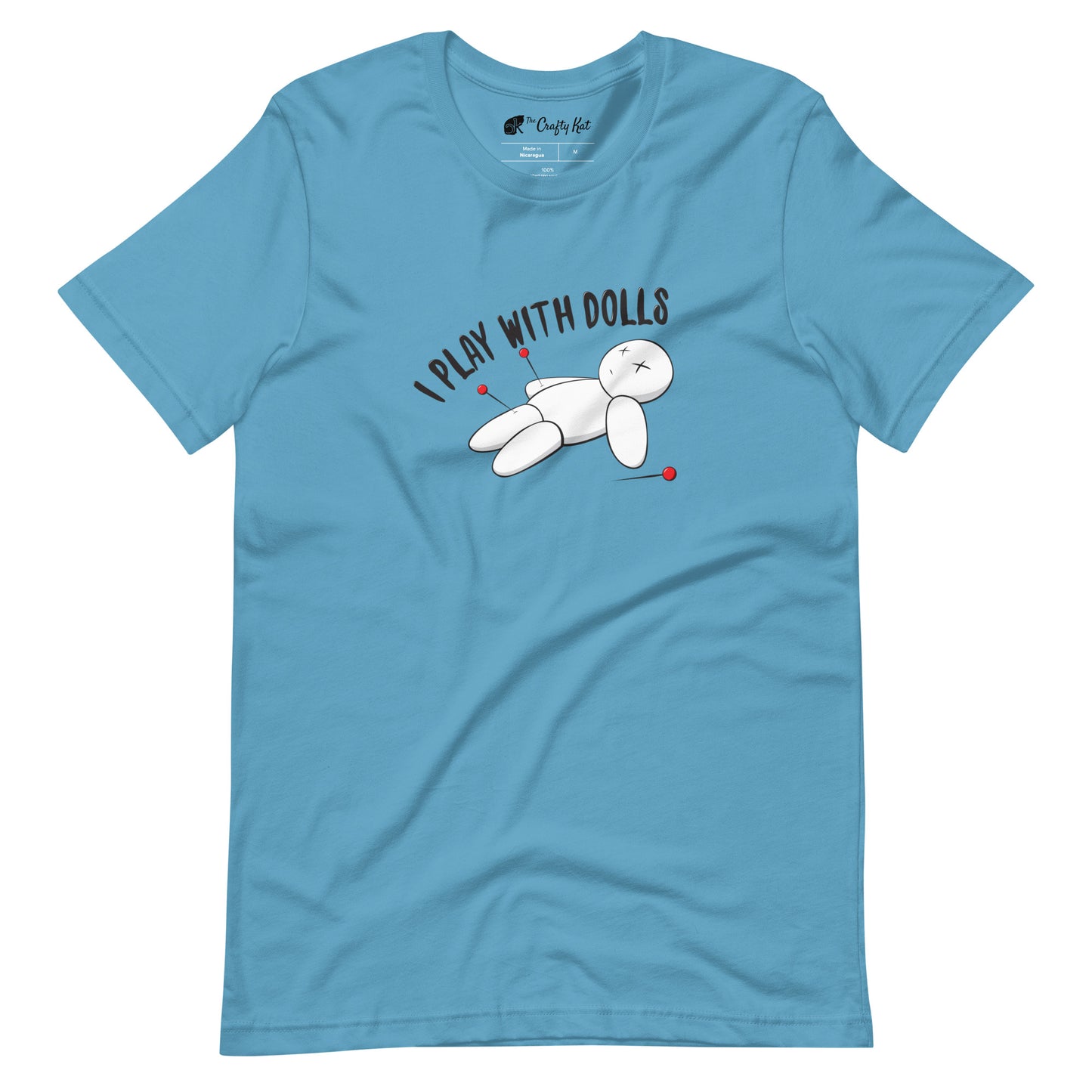 Ocean Blue t-shirt with graphic of white voodoo doll with Xs for eyes stuck with several pins and text "I PLAY WITH DOLLS"
