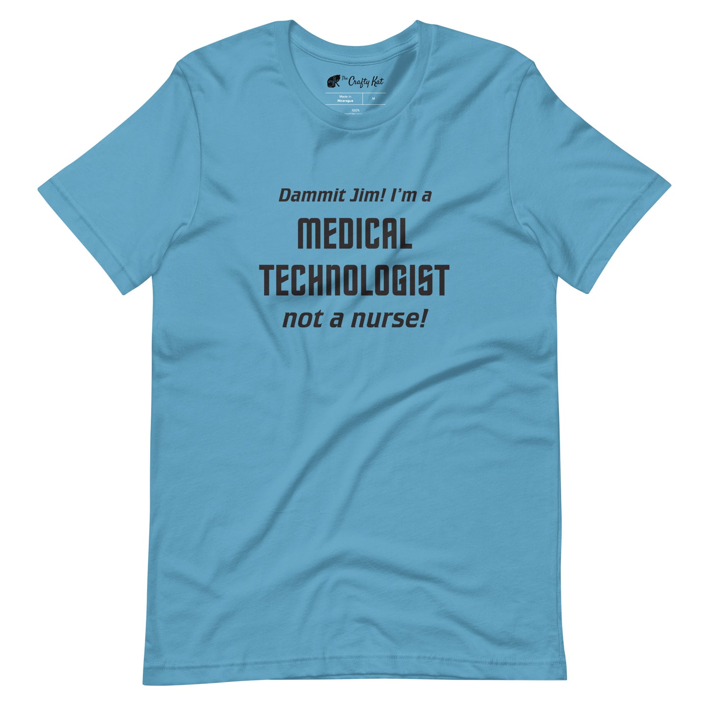 Ocean Blue t-shirt with text graphic in Star Trek font: "Dammit Jim! I'm a MEDICAL TECHNOLOGIST not a nurse!"