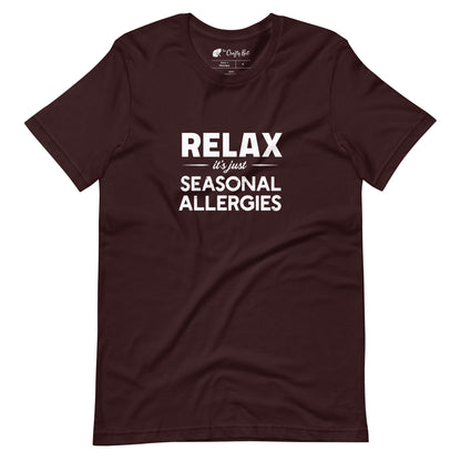 Oxblood Black t-shirt with white graphic: "RELAX it's just SEASONAL ALLERGIES"