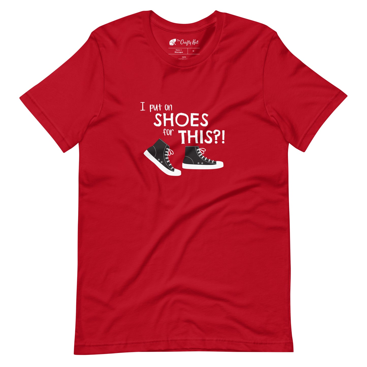 Red t-shirt with graphic of black and white canvas "chuck" sneakers and text: "I put on SHOES for THIS?!"