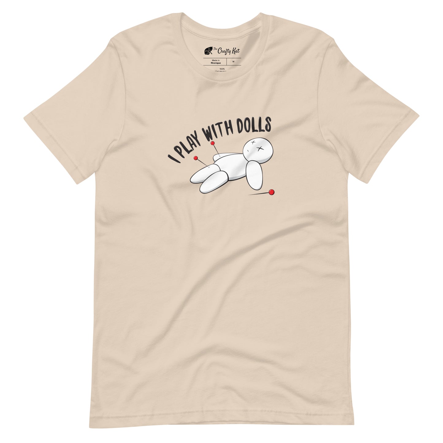 Soft Cream t-shirt with graphic of white voodoo doll with Xs for eyes stuck with several pins and text "I PLAY WITH DOLLS"