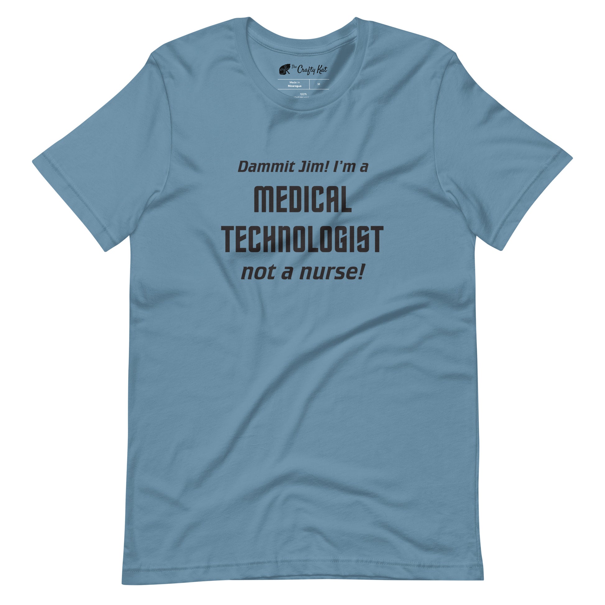 Steel Blue t-shirt with text graphic in Star Trek font: "Dammit Jim! I'm a MEDICAL TECHNOLOGIST not a nurse!"
