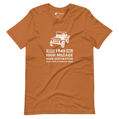 Toast (yellow orange) t-shirt with distressed graphic of old military jeep and text "Original YEAR model HIGH MILEAGE some restoration MOST PARTS IN WORKING ORDER"