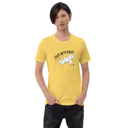 Model wearing Yellow t-shirt with graphic of white voodoo doll with Xs for eyes stuck with several pins and text "I PLAY WITH DOLLS"
