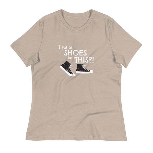 Heather Stone women's relaxed fit t-shirt with graphic of black and white canvas "chuck" sneakers and text: "I put on SHOES for THIS?!"