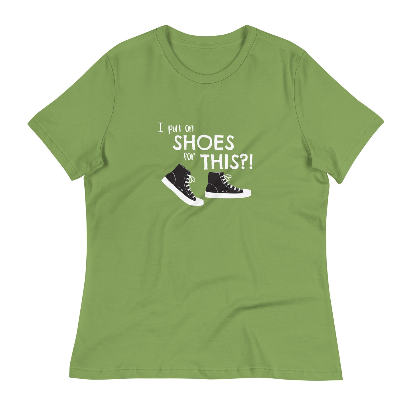 Leaf green women's relaxed fit t-shirt with graphic of black and white canvas "chuck" sneakers and text: "I put on SHOES for THIS?!"