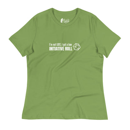 Leaf green women's relaxed-fit t-shirt with a graphic of a d20 (twenty-sided die) showing a roll of "1" and text: "I'm not LATE, I got a low INITIATIVE ROLL"