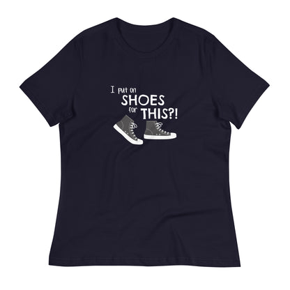 Navy women's relaxed fit t-shirt with graphic of black and white canvas "chuck" sneakers and text: "I put on SHOES for THIS?!"