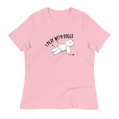 Pink women's relaxed fit t-shirt with graphic of white voodoo doll with Xs for eyes stuck with several pins and text "I PLAY WITH DOLLS"