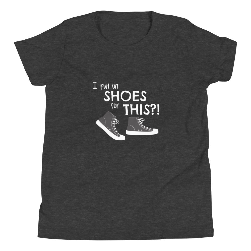 Dark Grey Heather youth t-shirt with graphic of black and white canvas "chuck" sneakers and text: "I put on SHOES for THIS?!"