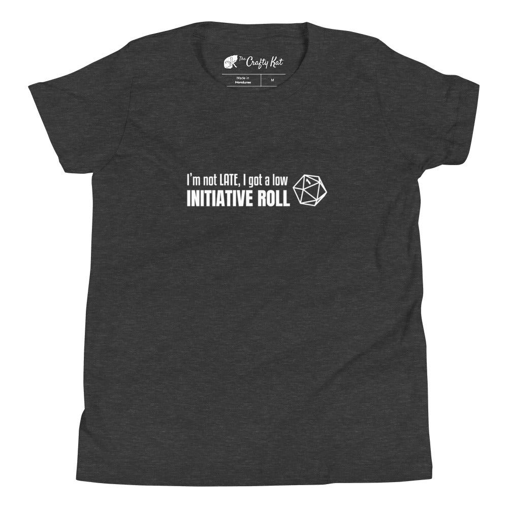 Dark Grey Heather youth t-shirt with a graphic of a d20 (twenty-sided die) showing a roll of "1" and text: "I'm not LATE, I got a low INITIATIVE ROLL"