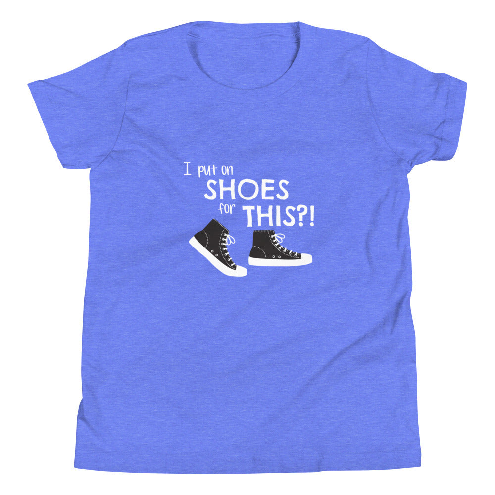 Heather Columbia Blue youth t-shirt with graphic of black and white canvas "chuck" sneakers and text: "I put on SHOES for THIS?!"