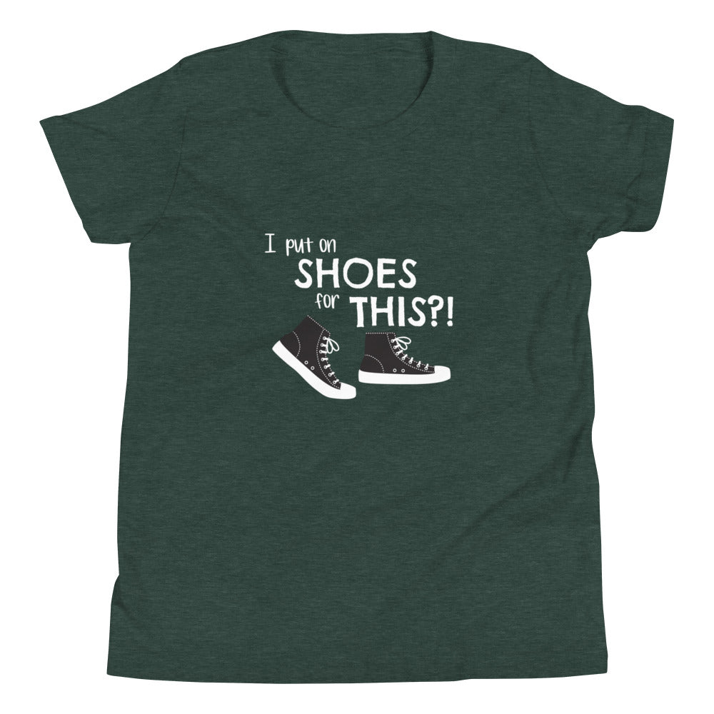Heather Forest green youth t-shirt with graphic of black and white canvas "chuck" sneakers and text: "I put on SHOES for THIS?!"