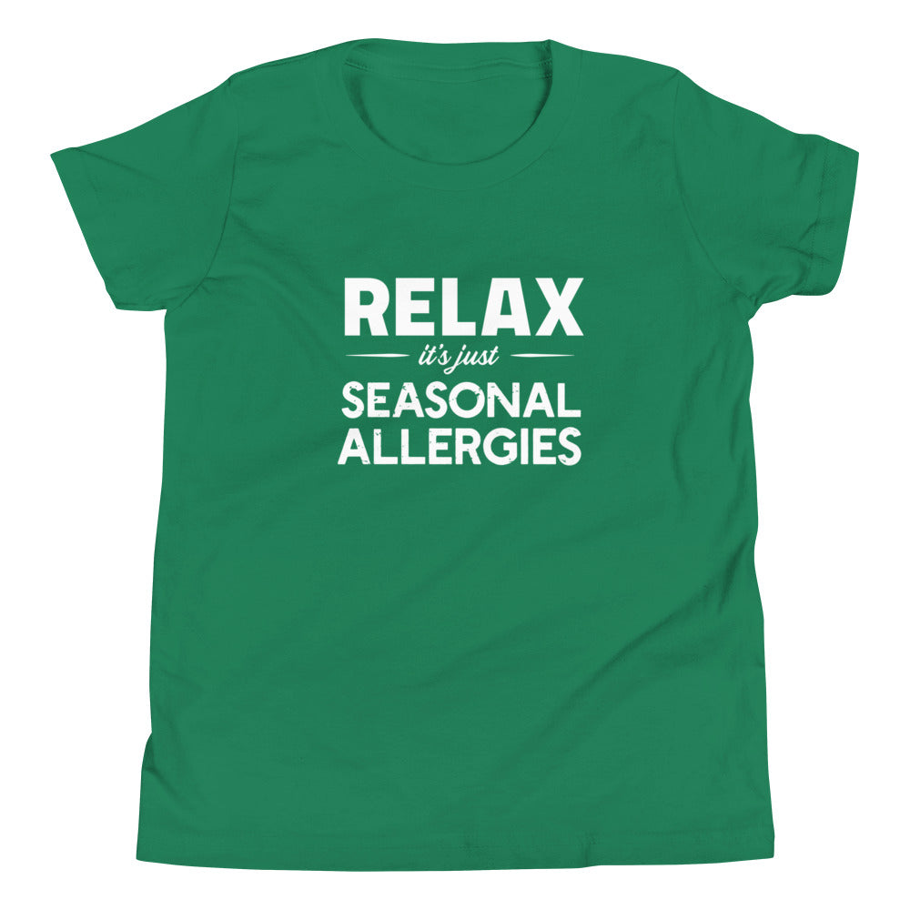 Kelly green youth t-shirt with white graphic: "RELAX it's just SEASONAL ALLERGIES"