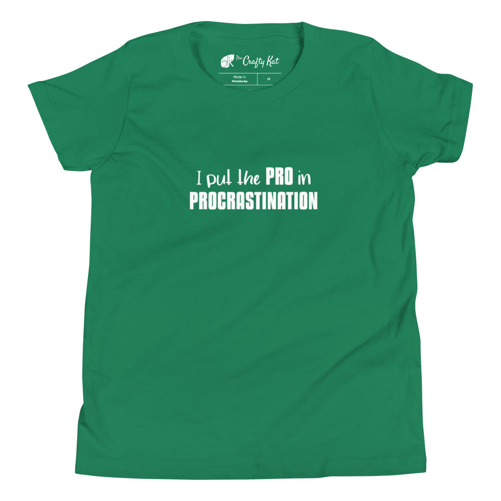 Kelly green youth t-shirt with text graphic: "I put the PRO in PROCRASTINATION"