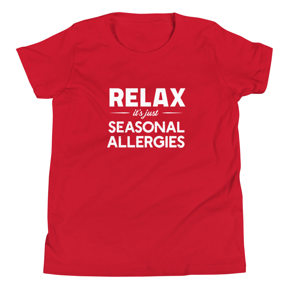 Red youth t-shirt with white graphic: "RELAX it's just SEASONAL ALLERGIES"