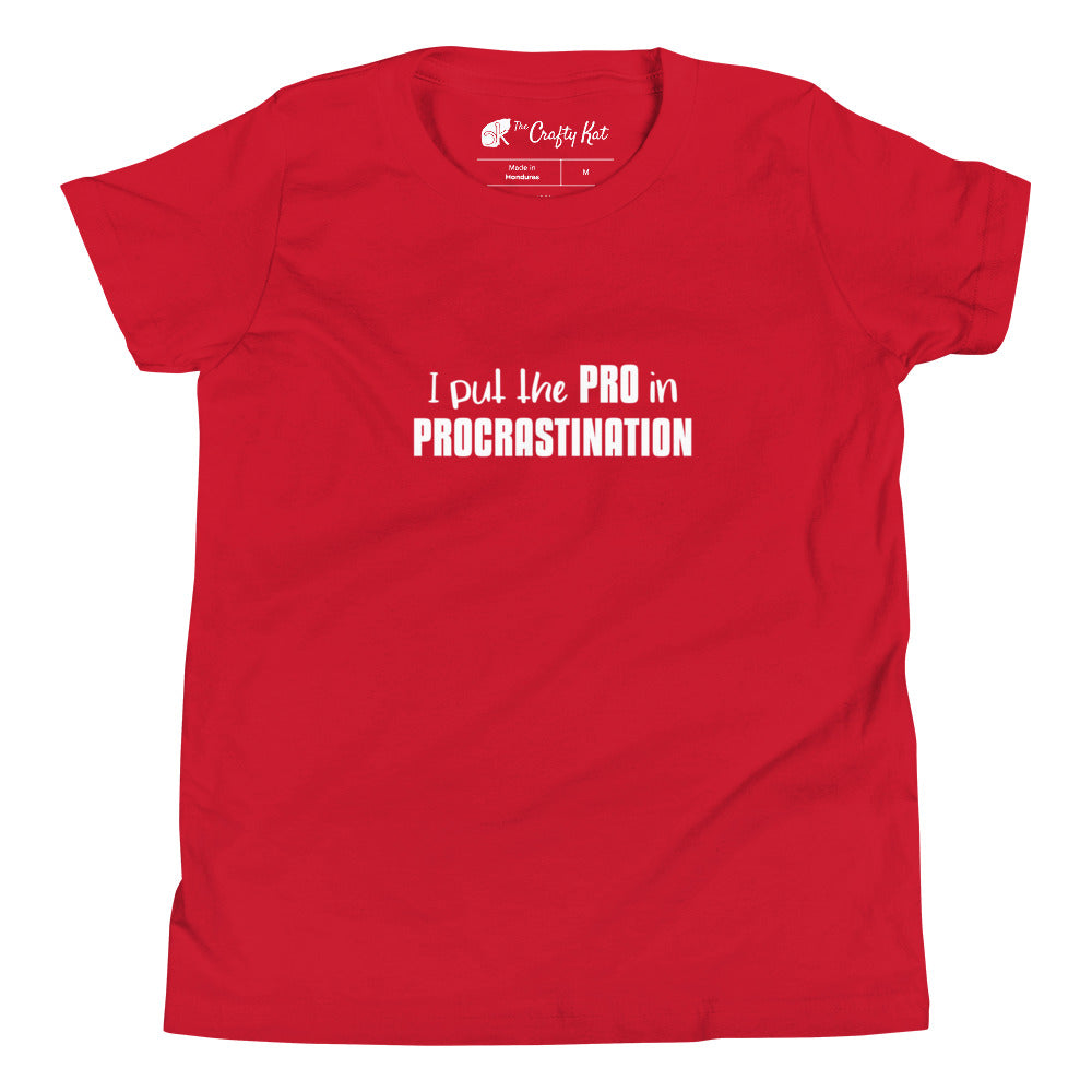 Red youth t-shirt with text graphic: "I put the PRO in PROCRASTINATION"