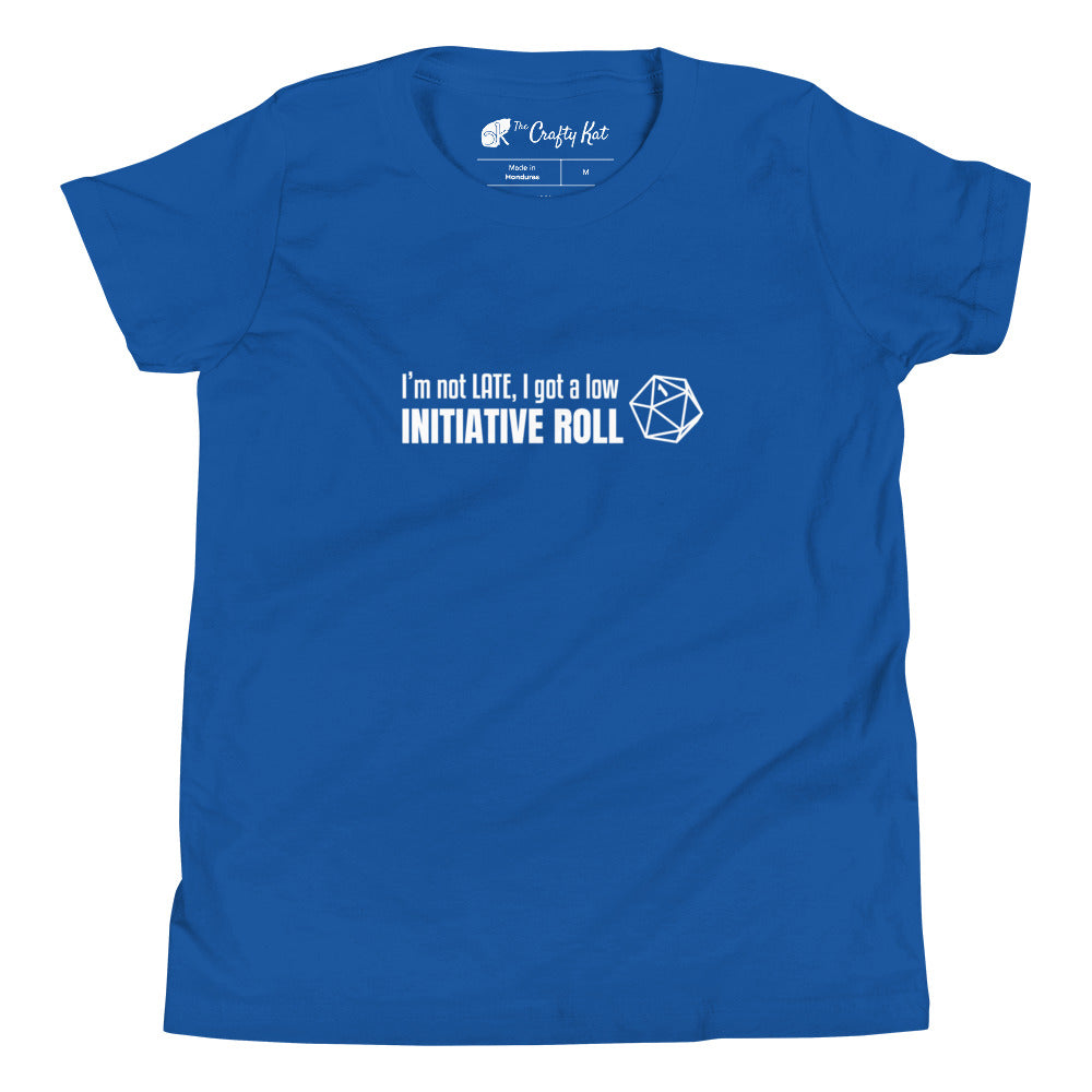 True Royal blue youth t-shirt with a graphic of a d20 (twenty-sided die) showing a roll of "1" and text: "I'm not LATE, I got a low INITIATIVE ROLL"